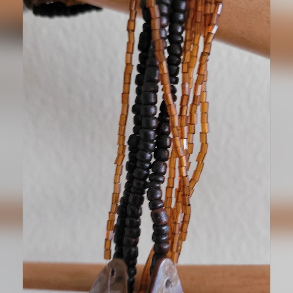 Multi Strand Chunky Necklace with Shell and Stacked Wooden Beads. - Picture 5 of 6